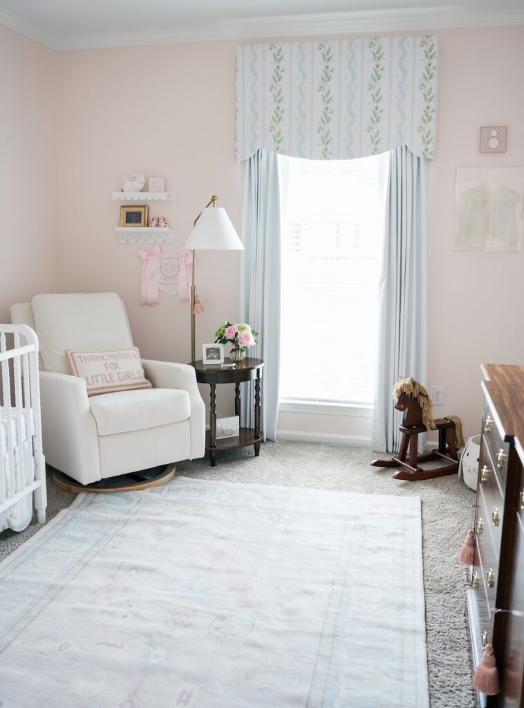 photo of corner of nursery to show off soft pink and pastel colors in the nursery